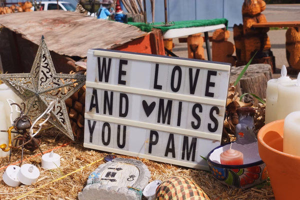 Sign for Pam's Place, a roadside stand